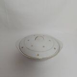 White earthenware soup tureen with a golden pattern.