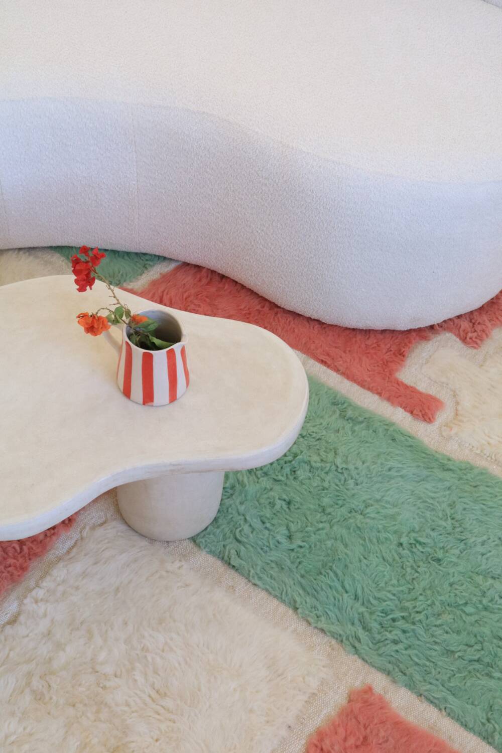 Moroccan Berber rug in green and pink.