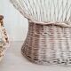 Antique armchair in gray woven wicker