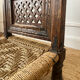 Traditional Indian low chair made of wood and rope.