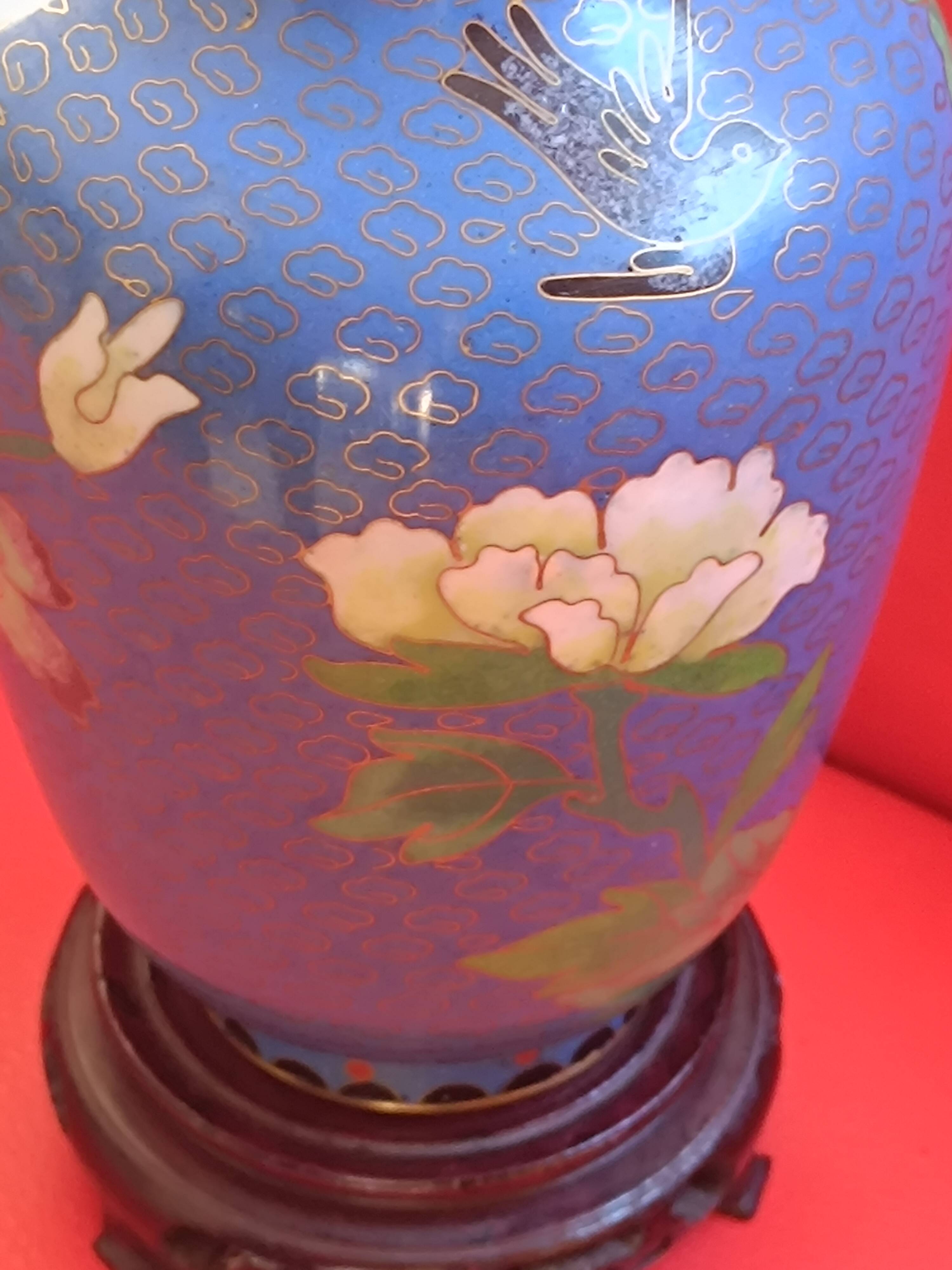Chinese enamelled vase on copper on a base. Shades of blue.