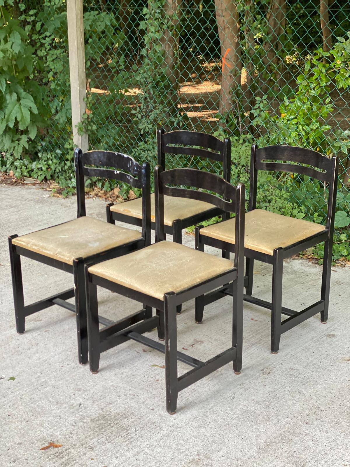 4 black solid wood and beige leather chairs from the 80s