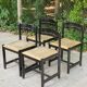 4 black solid wood and beige leather chairs from the 80s