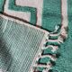 Beni Ourain Berber rug made of natural wool, traditionally handwoven.