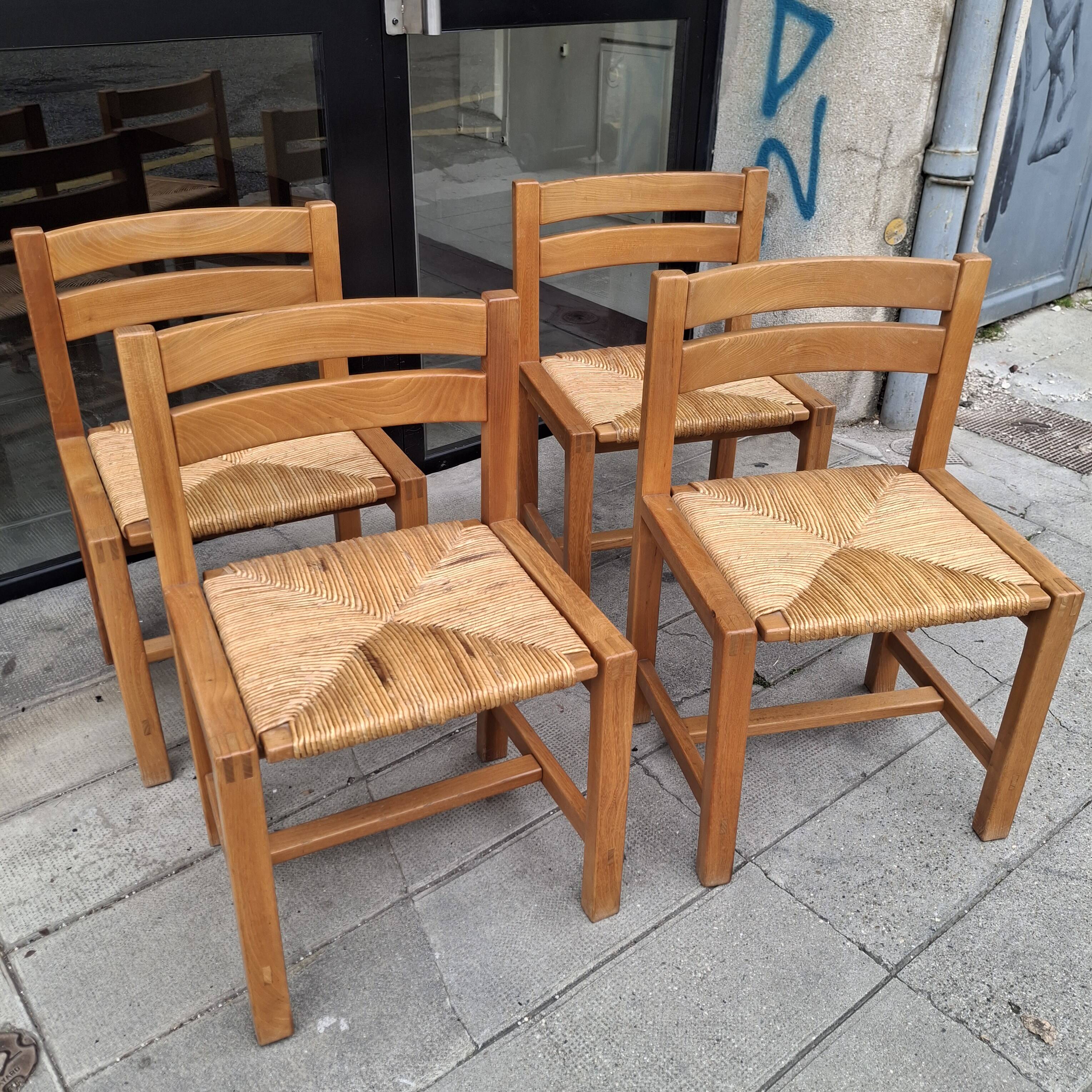 Set of four regaining chairs in elm. 1970
