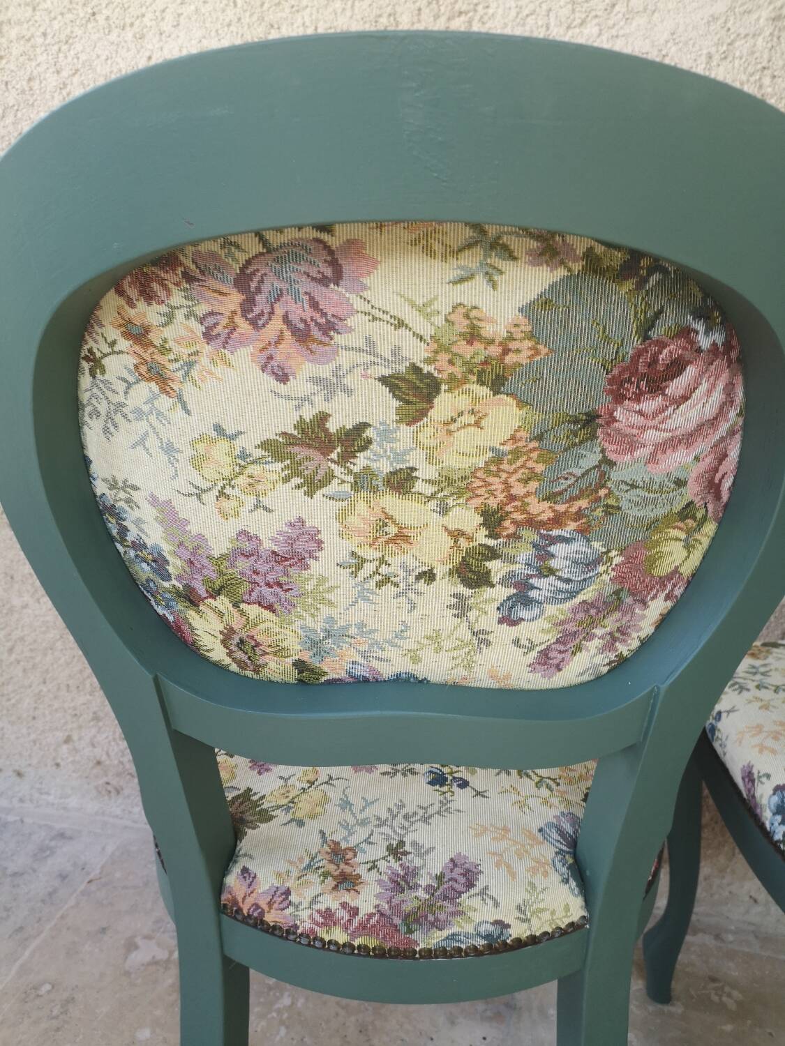 Antique chairs with studded upholstery.
