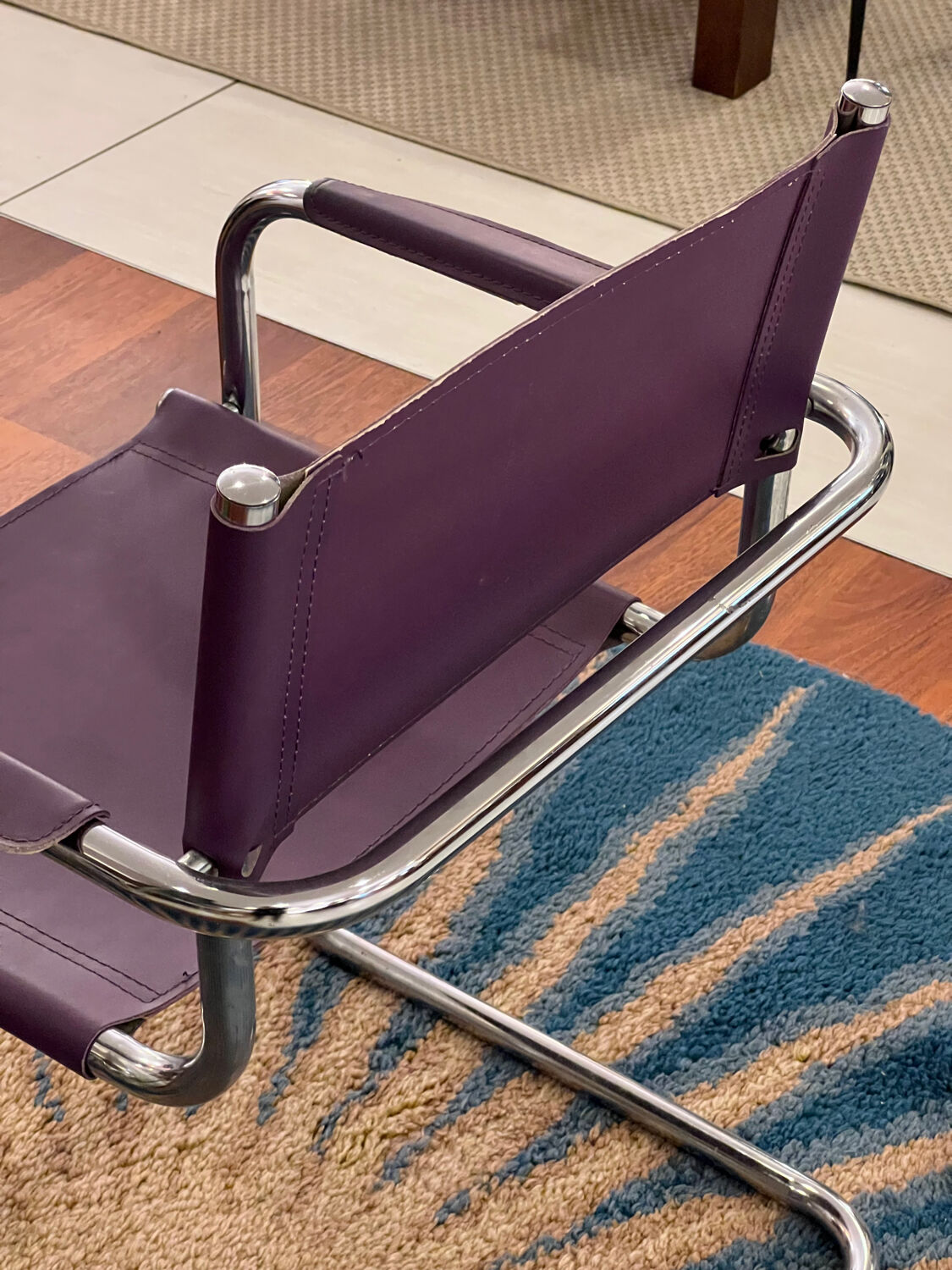 Purple cantilever armchair