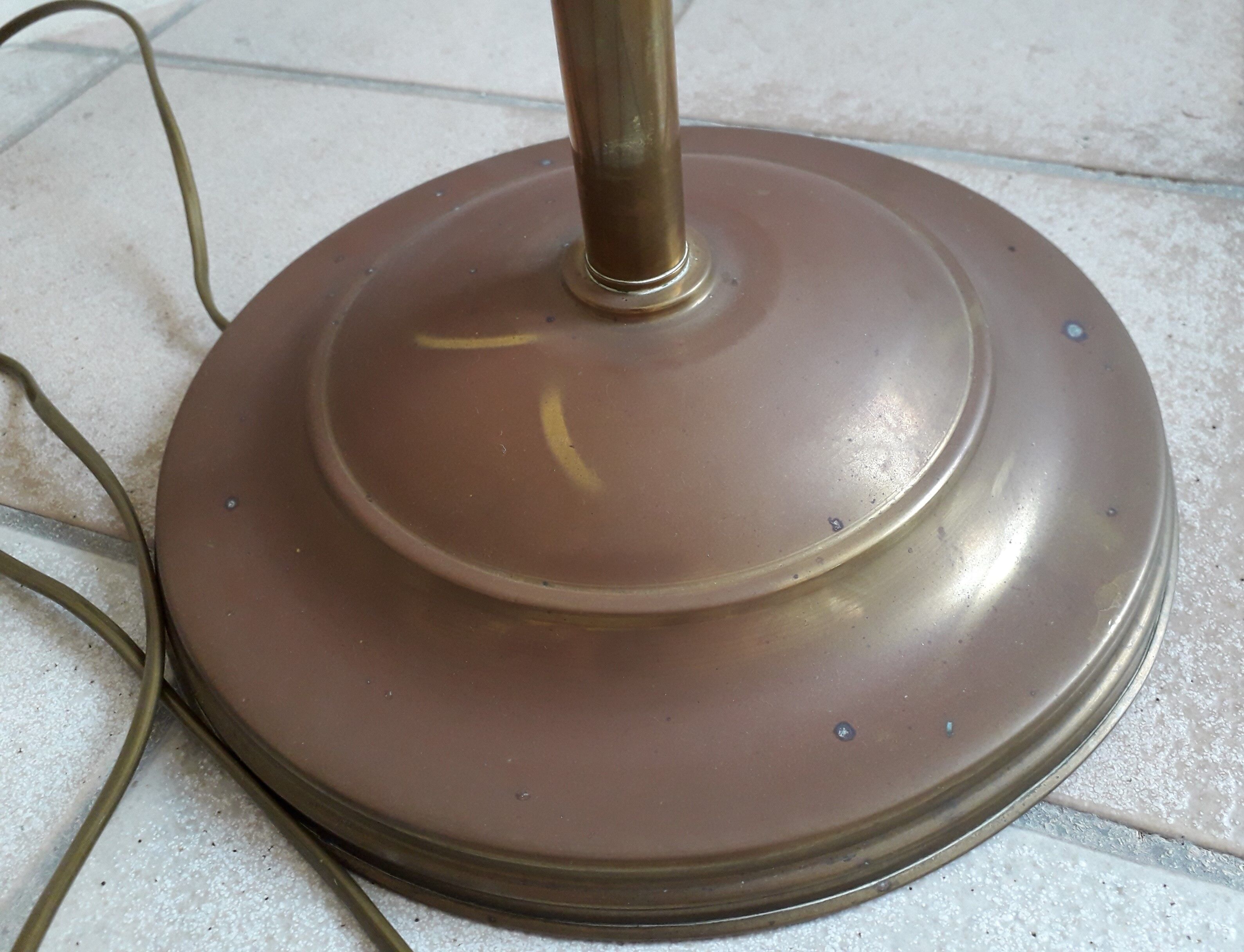 Articulated brass floor lamp