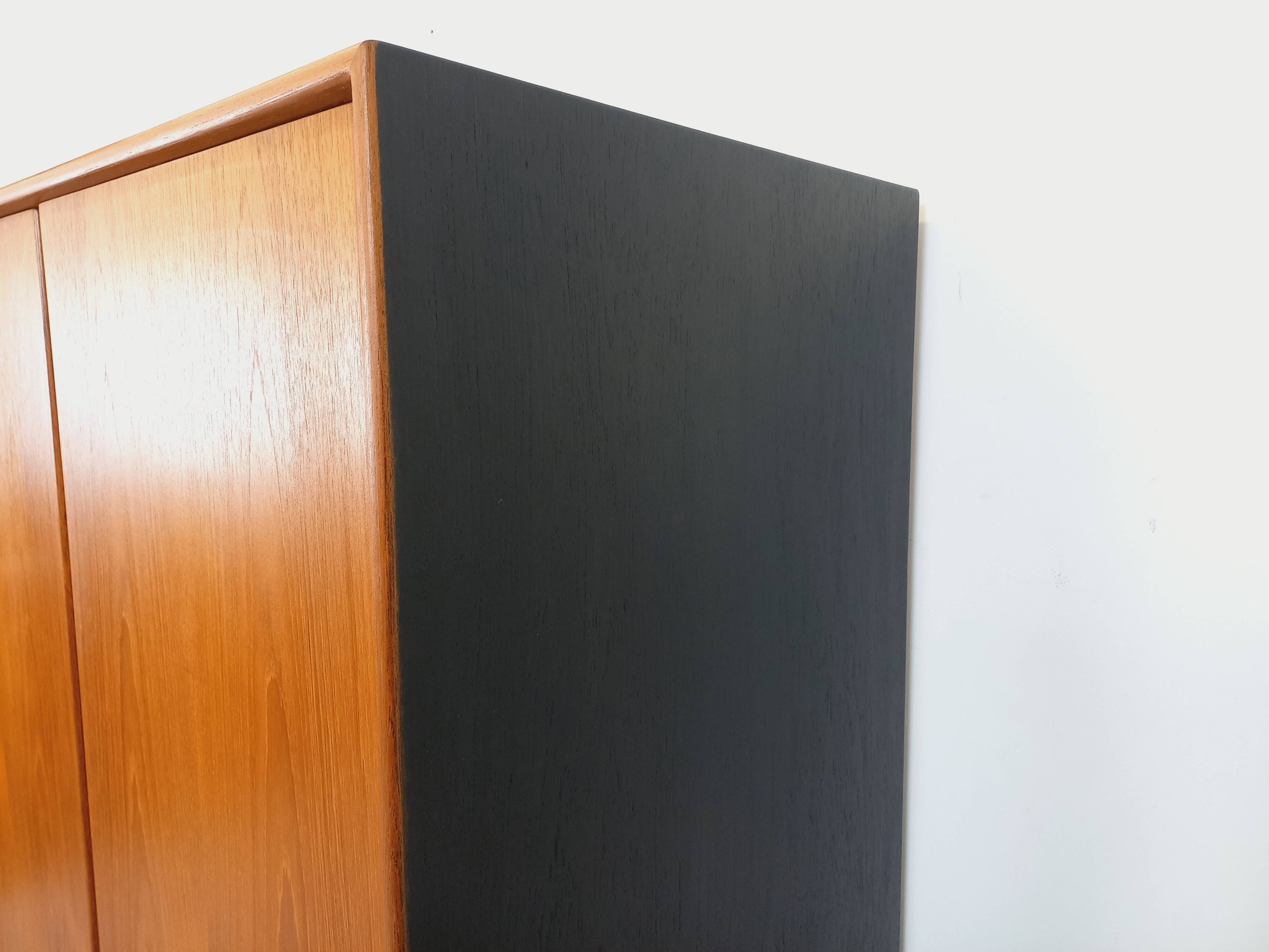 Vintage Scandinavian modernist wardrobe in teak and metal from the 1960s.