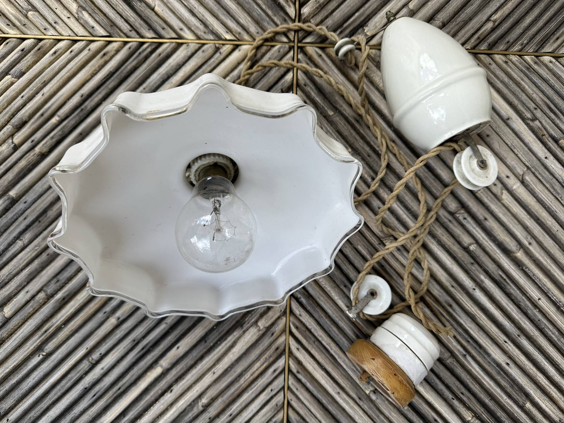 Vintage pleated opaline suspension with porcelain fittings.