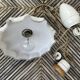 Vintage pleated opaline suspension with porcelain fittings.