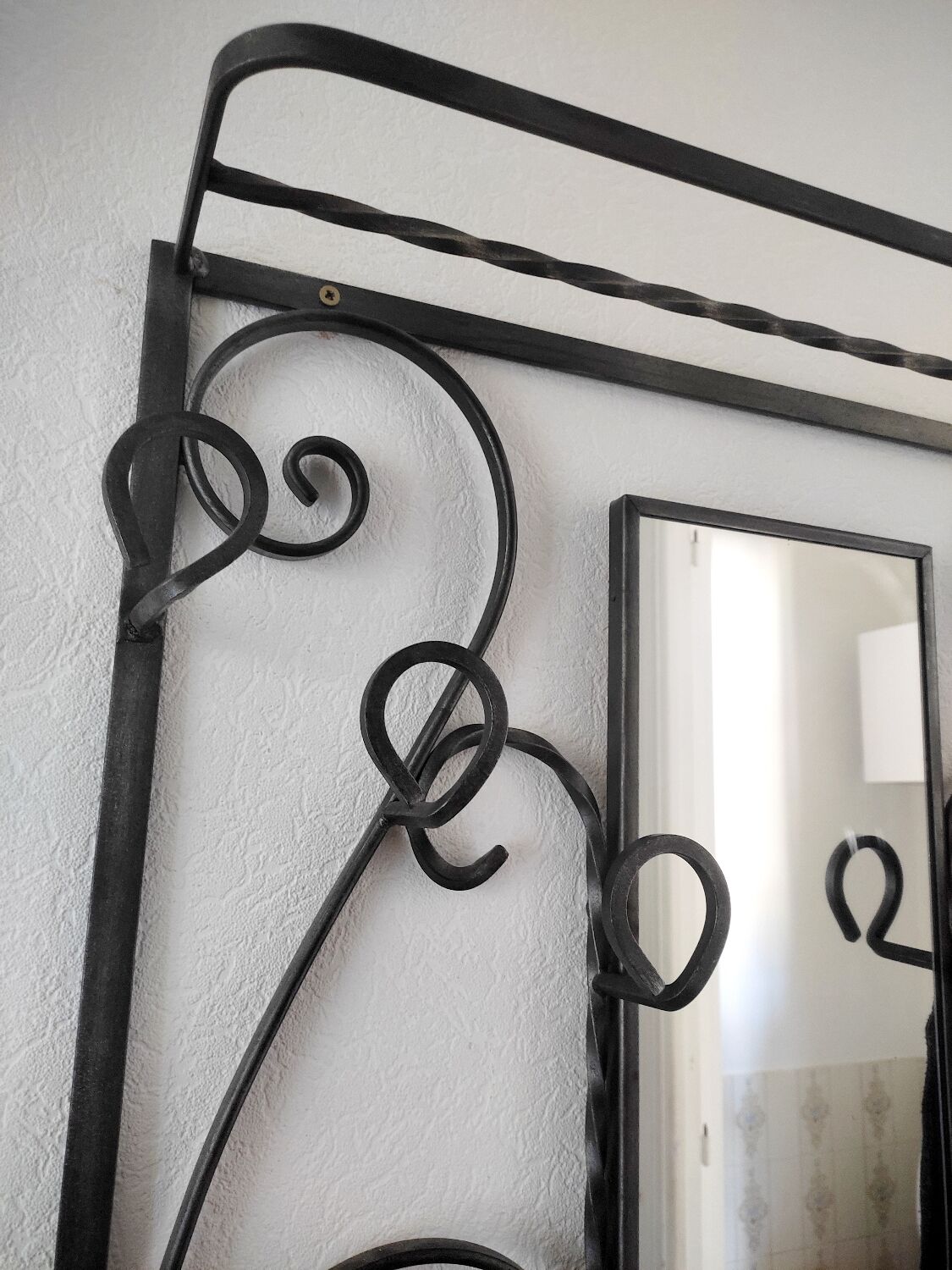 Wrought iron coat rack
