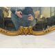 Antique mirror, 20th century, Louis XV style, gilded.