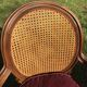 Paire de fauteuils style Louis XVI cannage