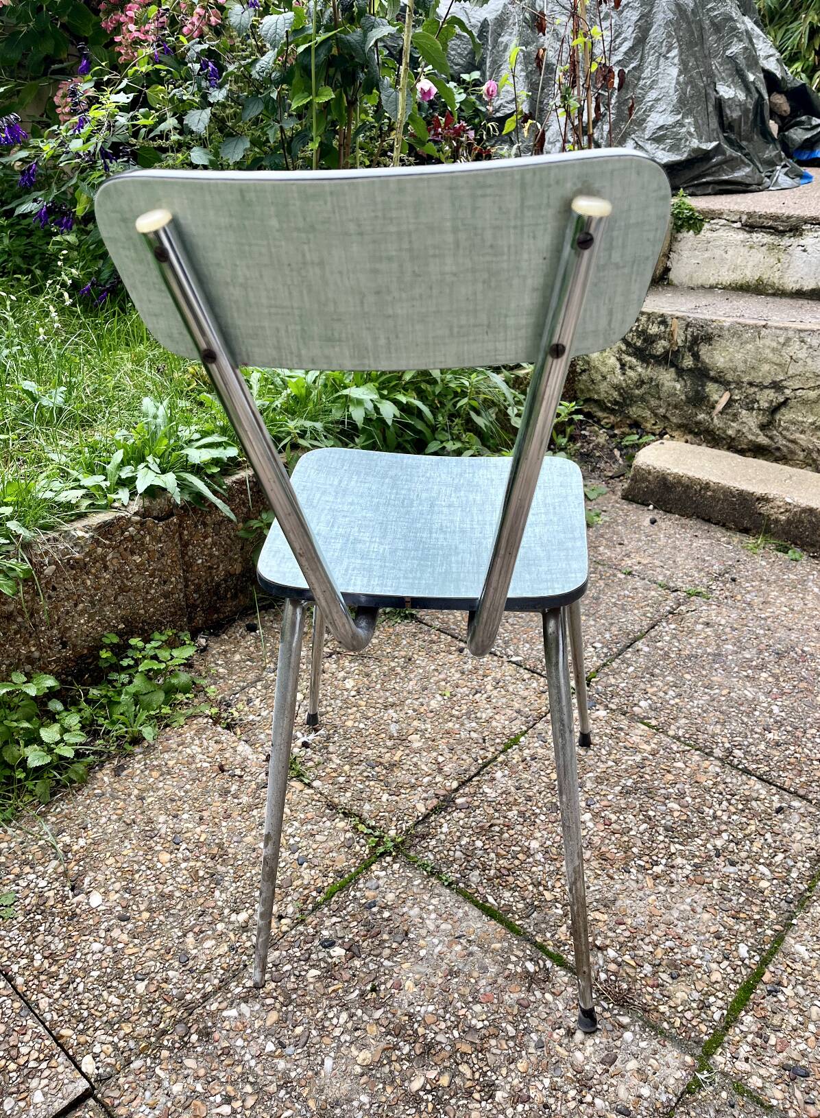 Green-blue Formica chair