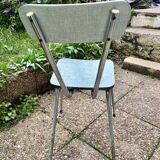 Green-blue Formica chair