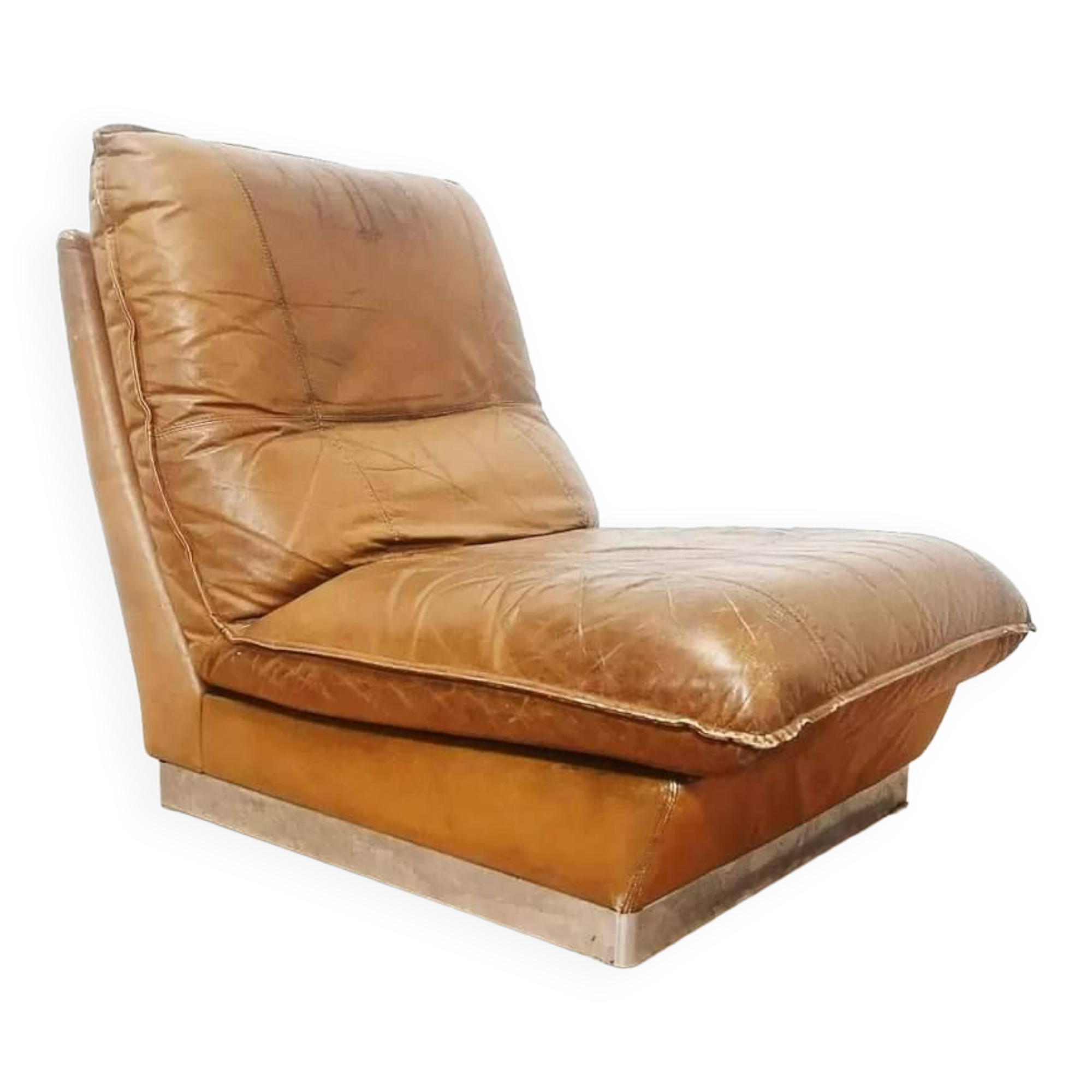 70s lounge chair in camel leather