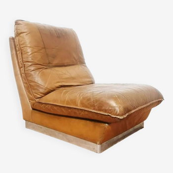 70s lounge chair in camel leather