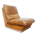 70s lounge chair in camel leather