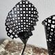 Perforated metal tealight candle holder