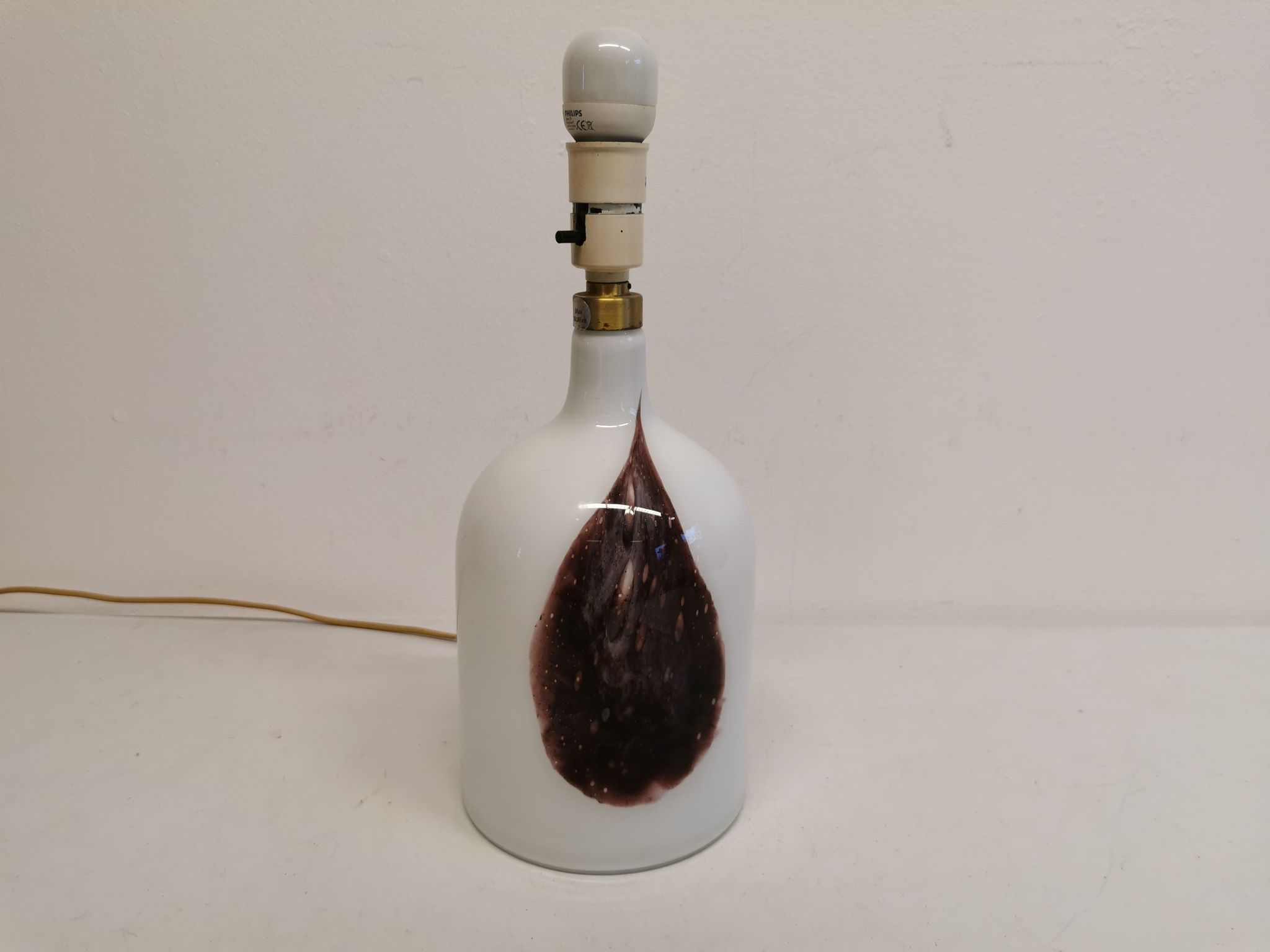 Older table lamp in milky white opaline glass with purple pattern / details from danish holmegaard.