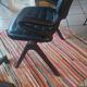 Two black leather armchairs