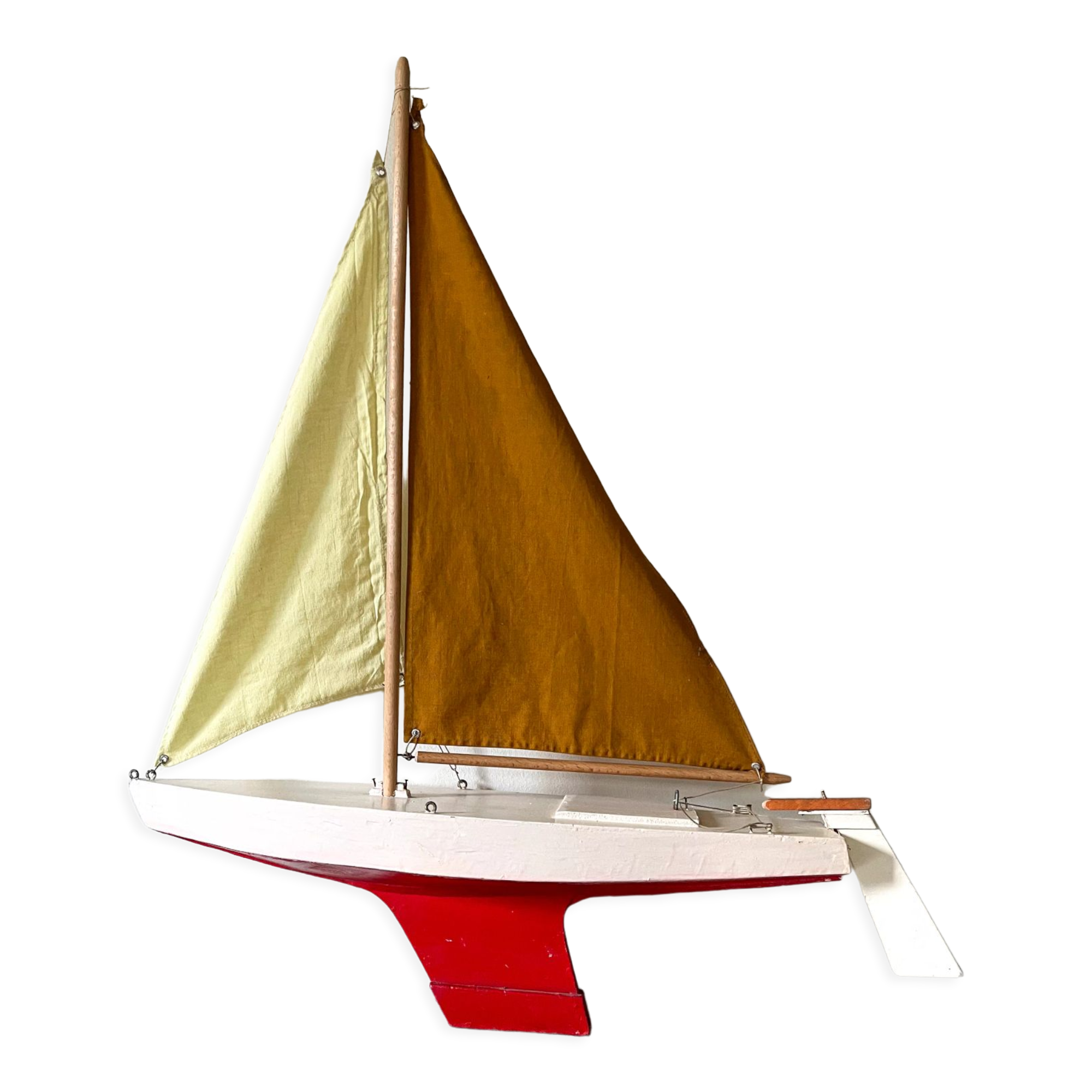 Navigable wooden sailing ship with pretty vintage colors