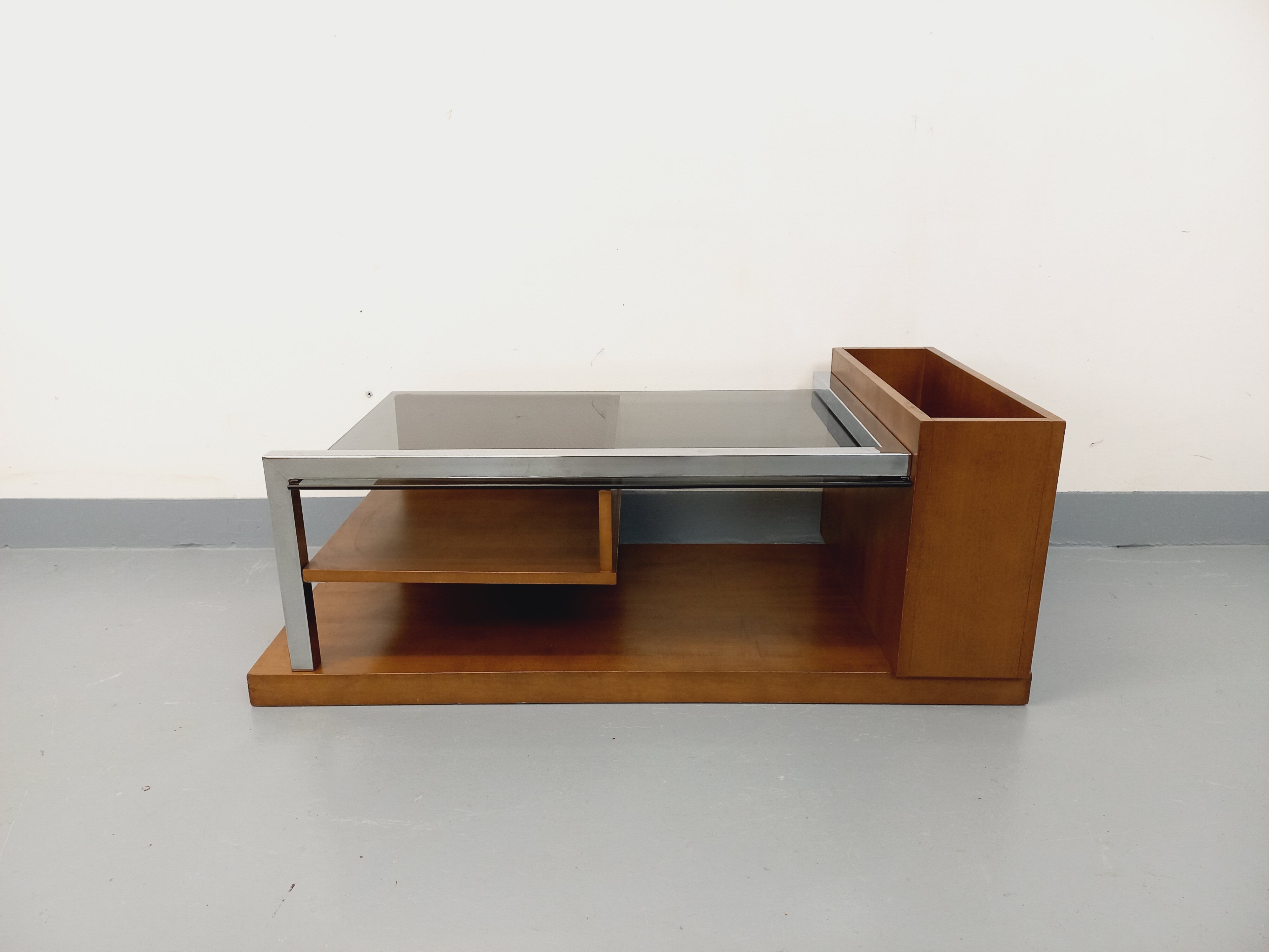 Rectangular vintage modernist coffee table with wooden niches, chrome.