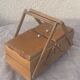 Sewing box in old varnished wood