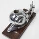 Silver snail candlestick on a teak base 1960