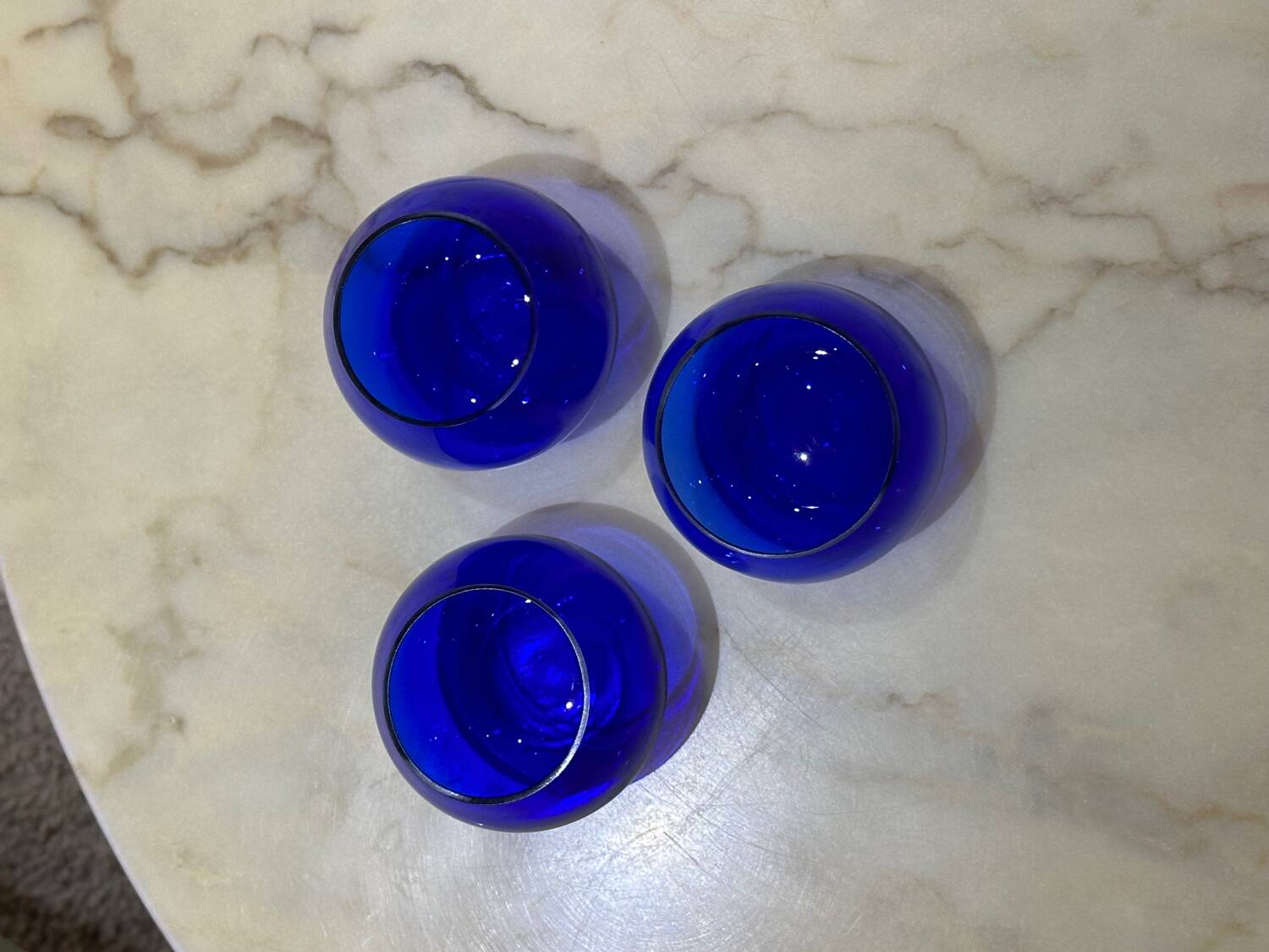 Set of 3 blue glass candle holders