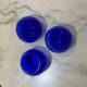 Set of 3 blue glass candle holders