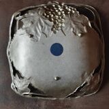Metal basket with vine decor