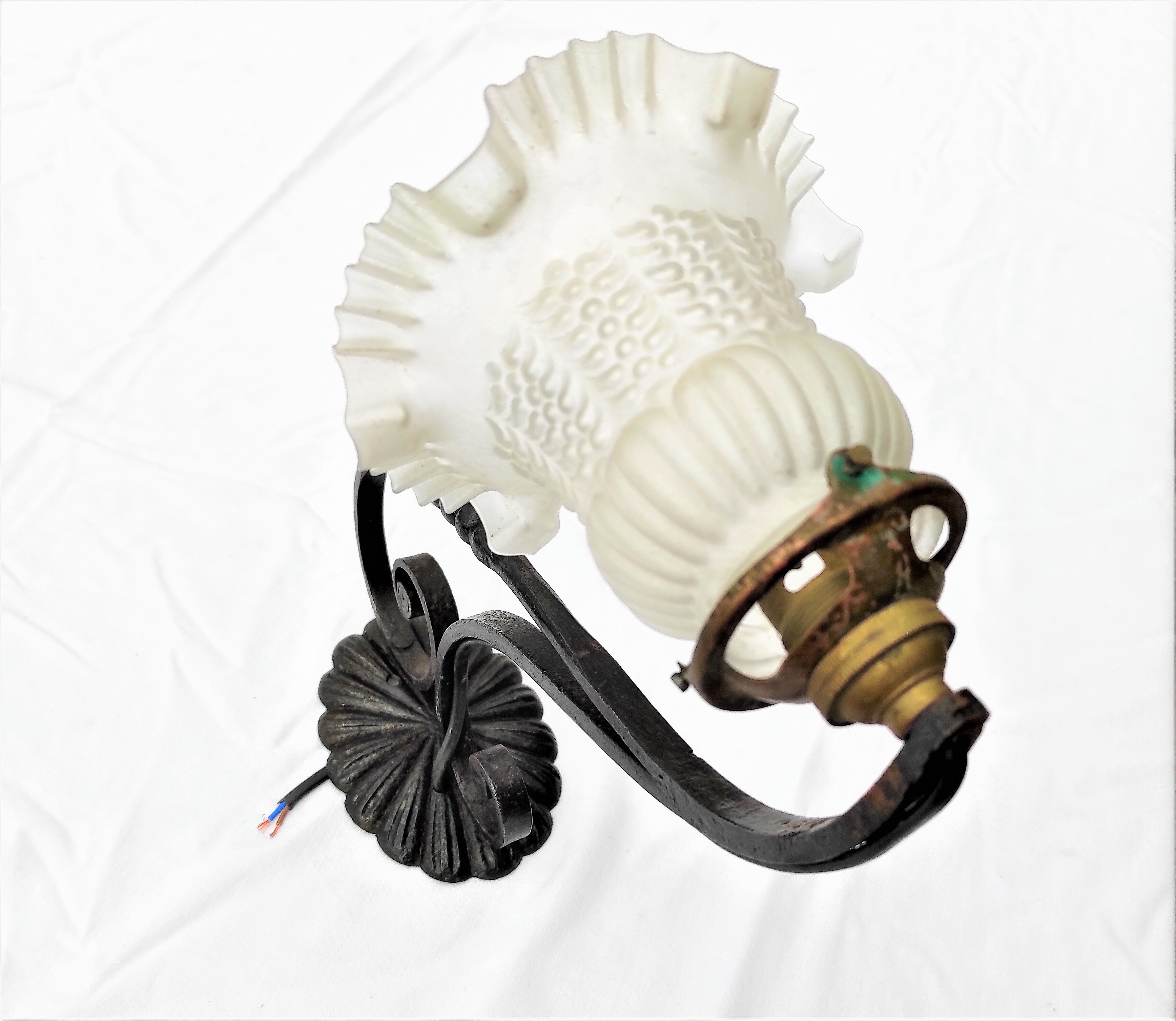 Interior wrought iron wall lamp early 20th centuries