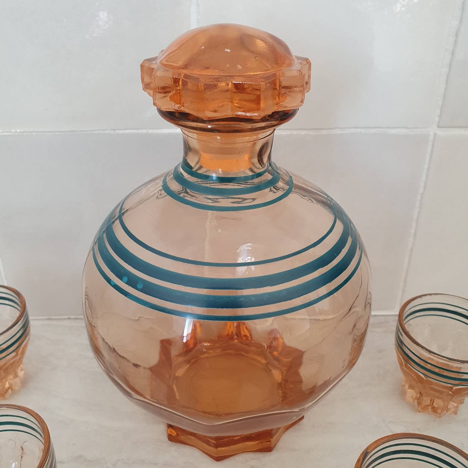 Pink and blue liqueur service and its small glasses