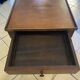 Small side table in Louis Philippe style with a patinated wood finish.