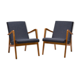 A pair of 300-138 armchairs from the 60s