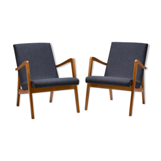 A pair of 300-138 armchairs from the 60s