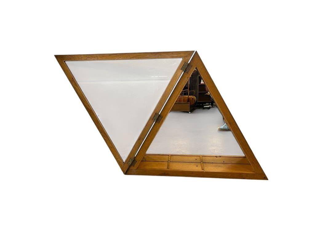 Vintage shallow wall display cabinet with a mirrored back.