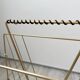 Vintage gold metal magazine rack