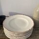 12 white old flat plates with brown fillet