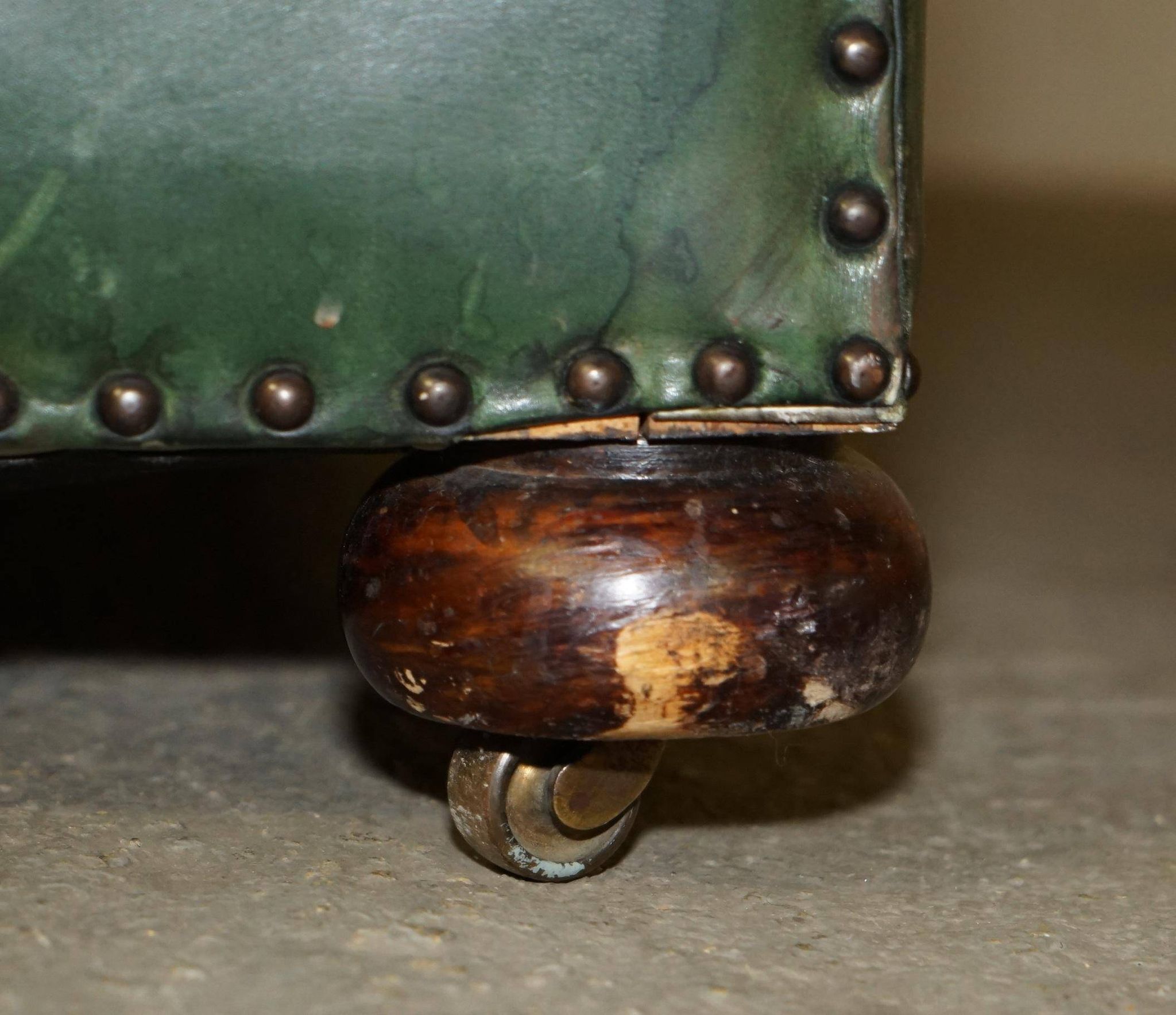 Victorian leather canapé, shield armrests, stamped Maple & Co.