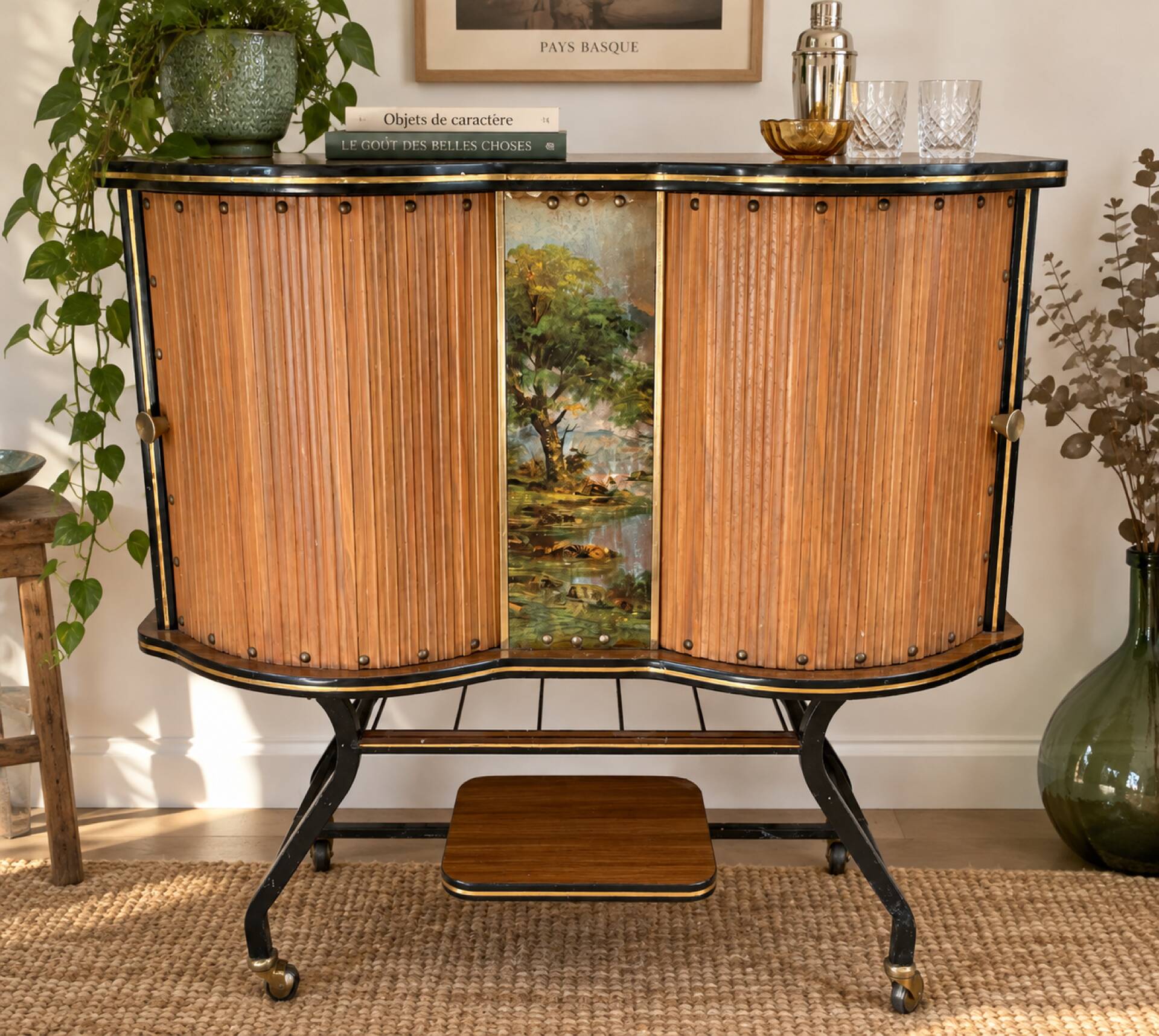 Vintage bar on wheels with tambour doors and painted decor – 1950s.