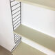 Swedish white shelves by Nisse Strinning for String of the 1960s