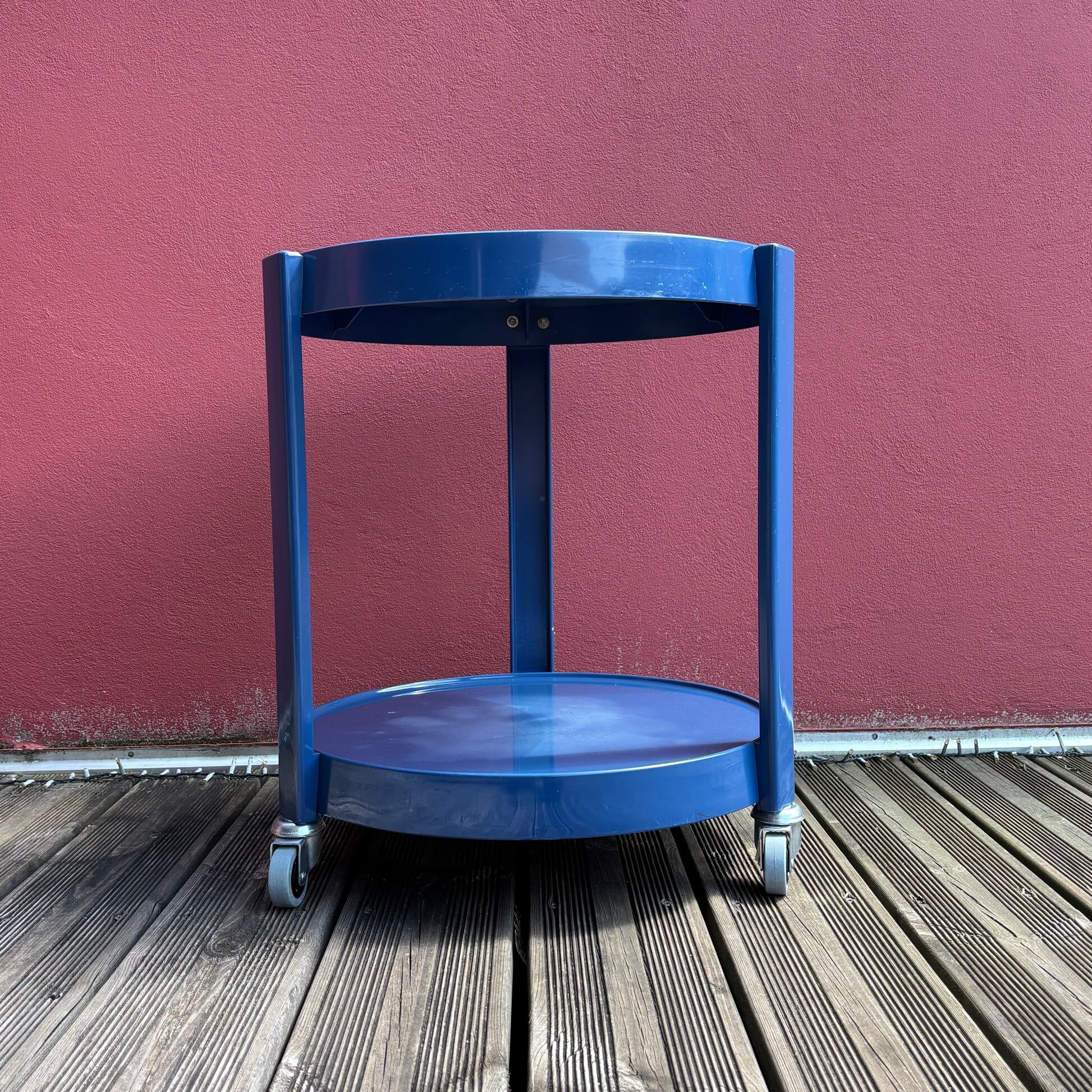 Space-age navy blue rolling dessert trolley