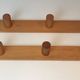 Charlotte Perriand, pair of fir wall coat racks, French work, around 1970
