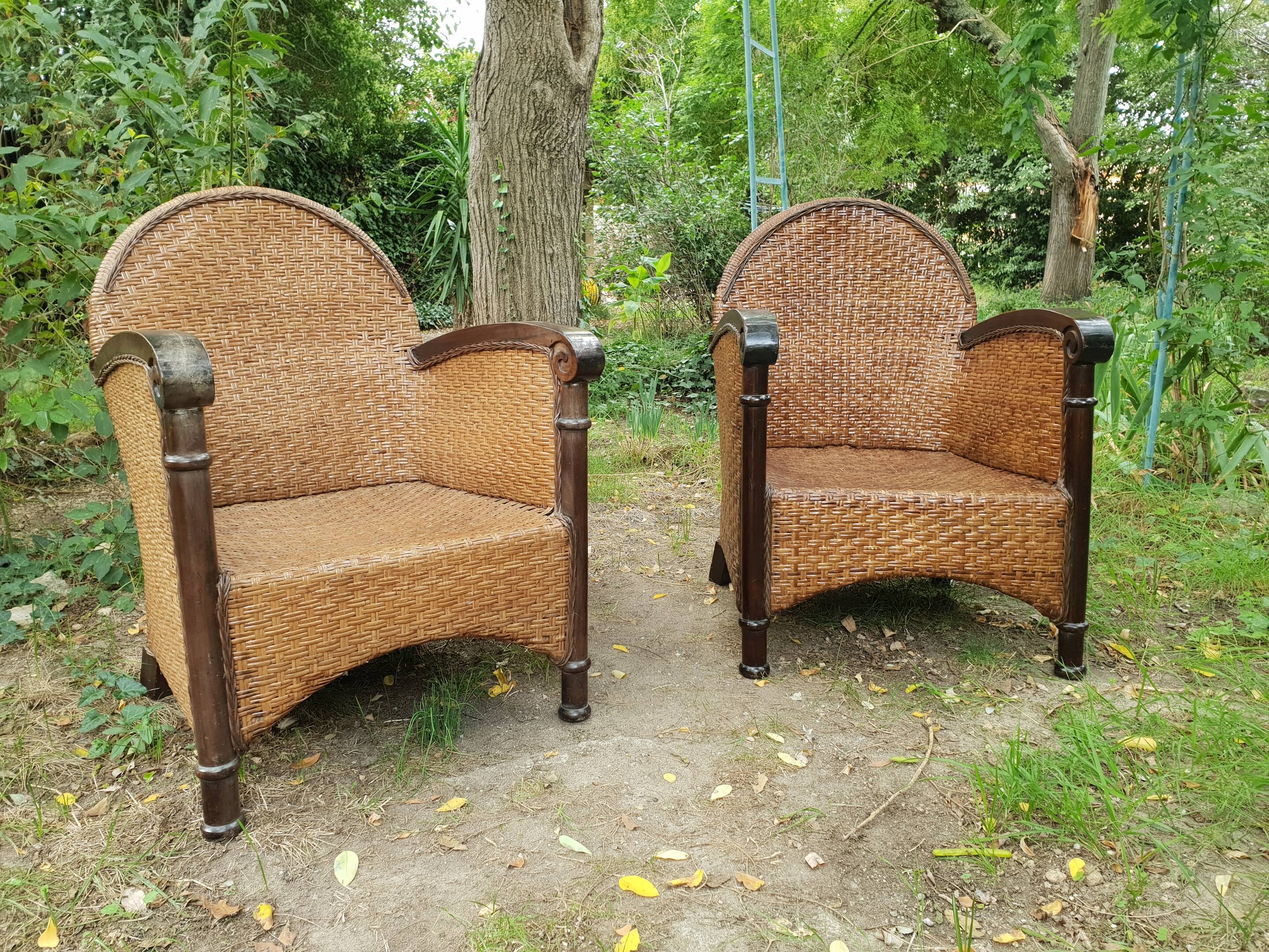 Paire de fauteuils en bois et rotin 1980
