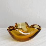 Thick amber yellow glass ashtray