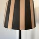 Vintage floor lamp in black patinated wood and striped lampshade