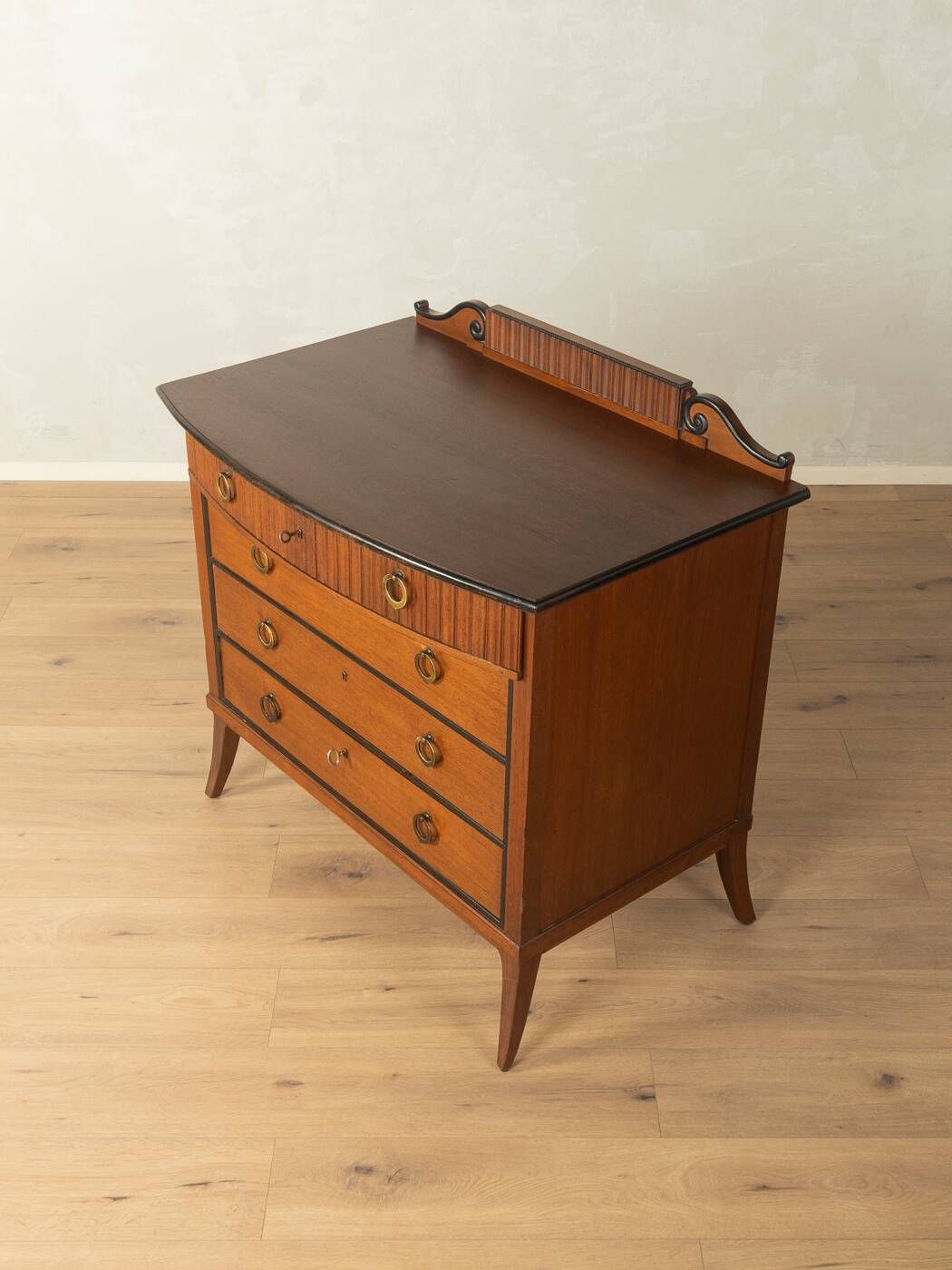 Classic chest of drawers from the 1920s in dark brown